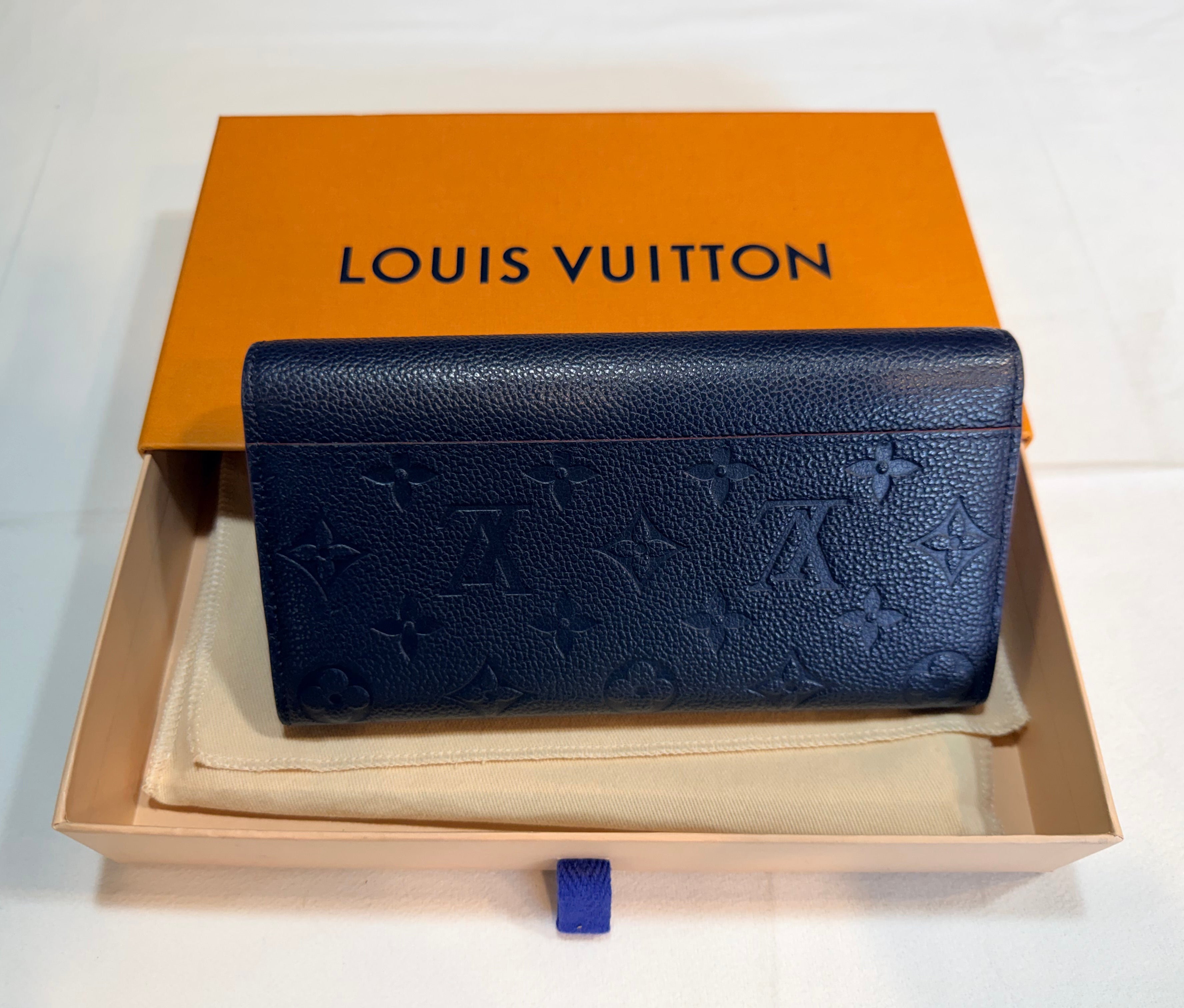 Louis Vuitton Sarah Wallet in Empreinte leather navy/red 42