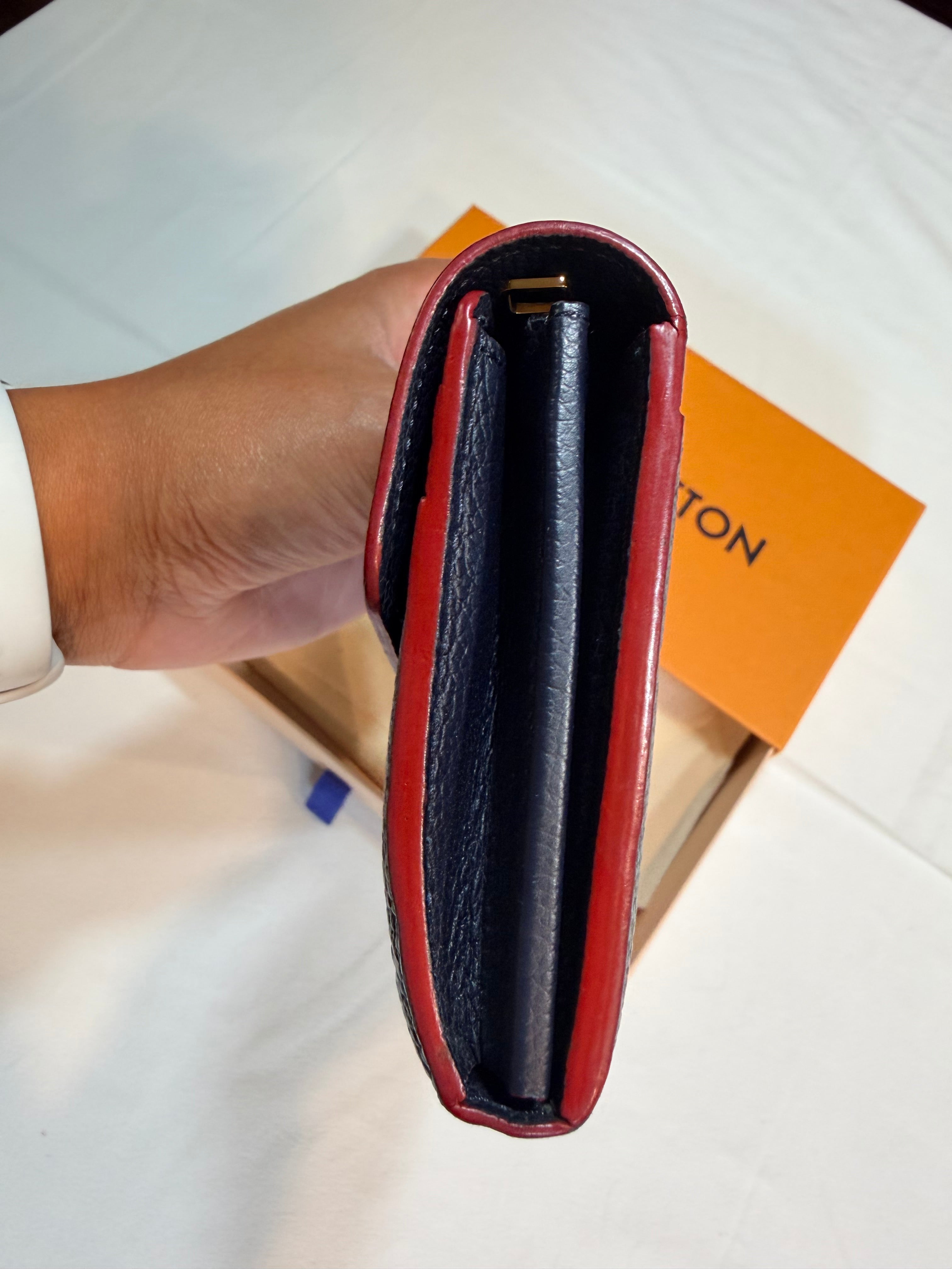 Louis Vuitton Sarah Wallet in Empreinte leather navy/red 42