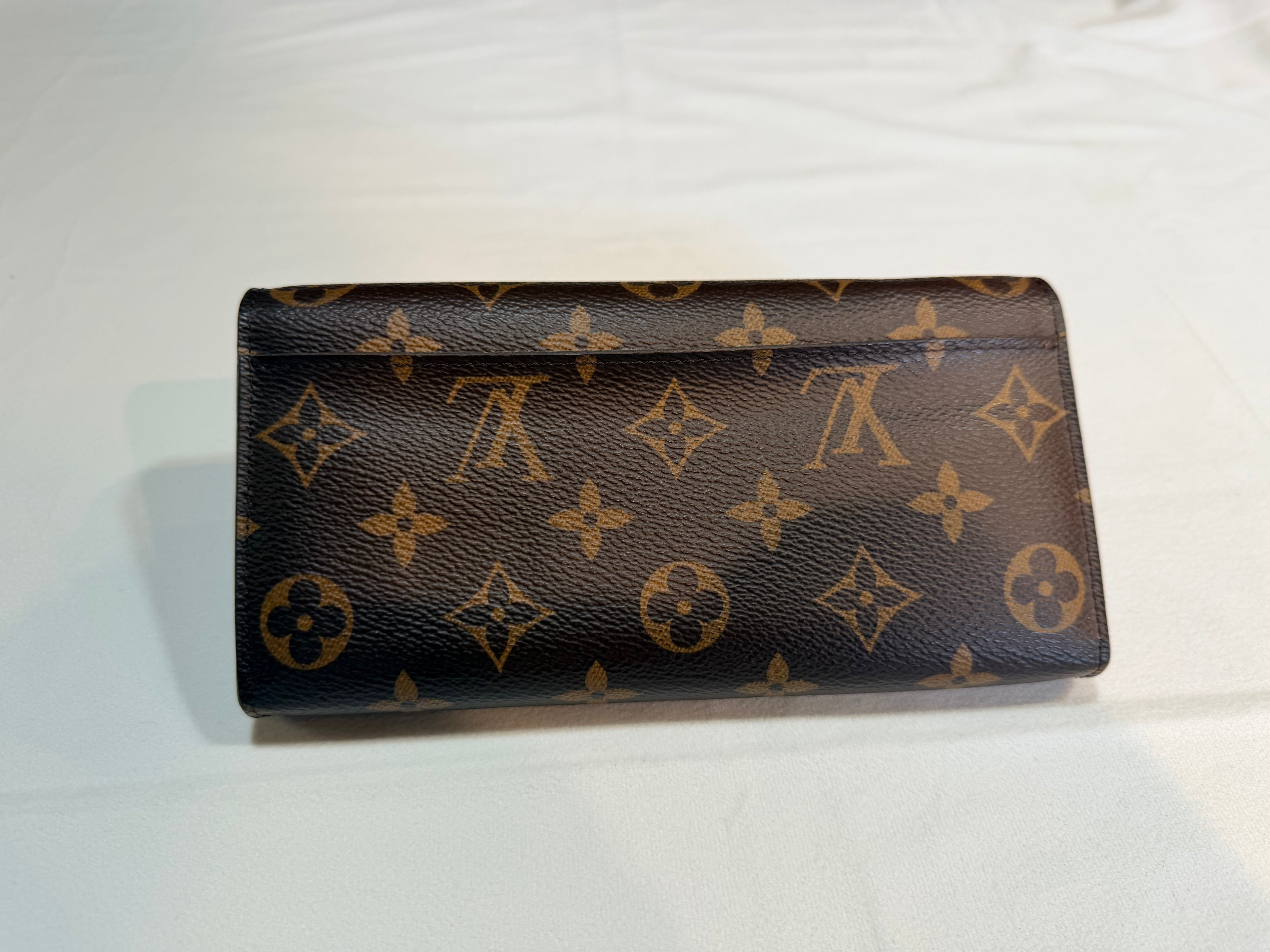 Lv monogram Sarah wallet 48