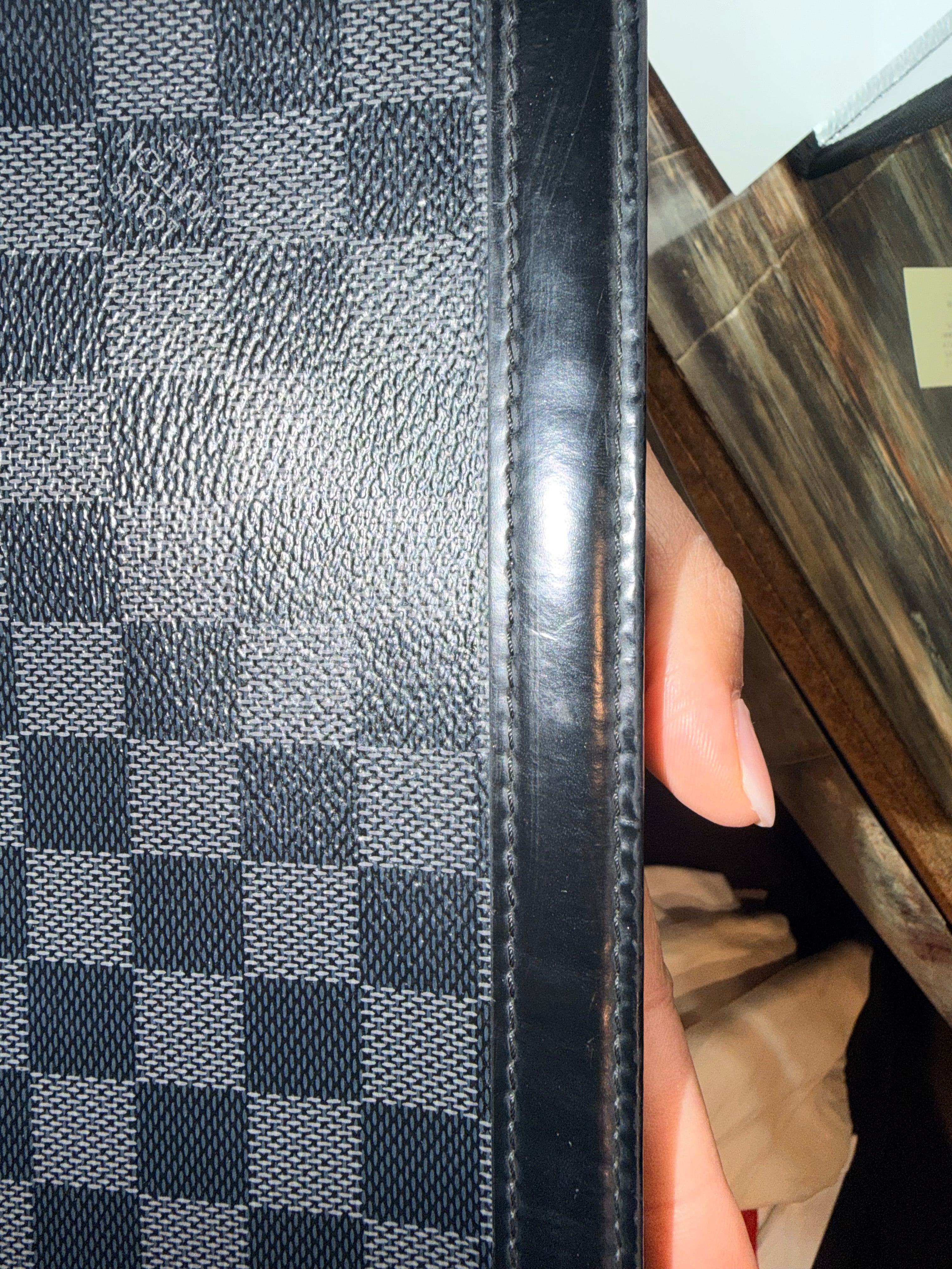 Louis Vuitton pocketed voyage mm 26