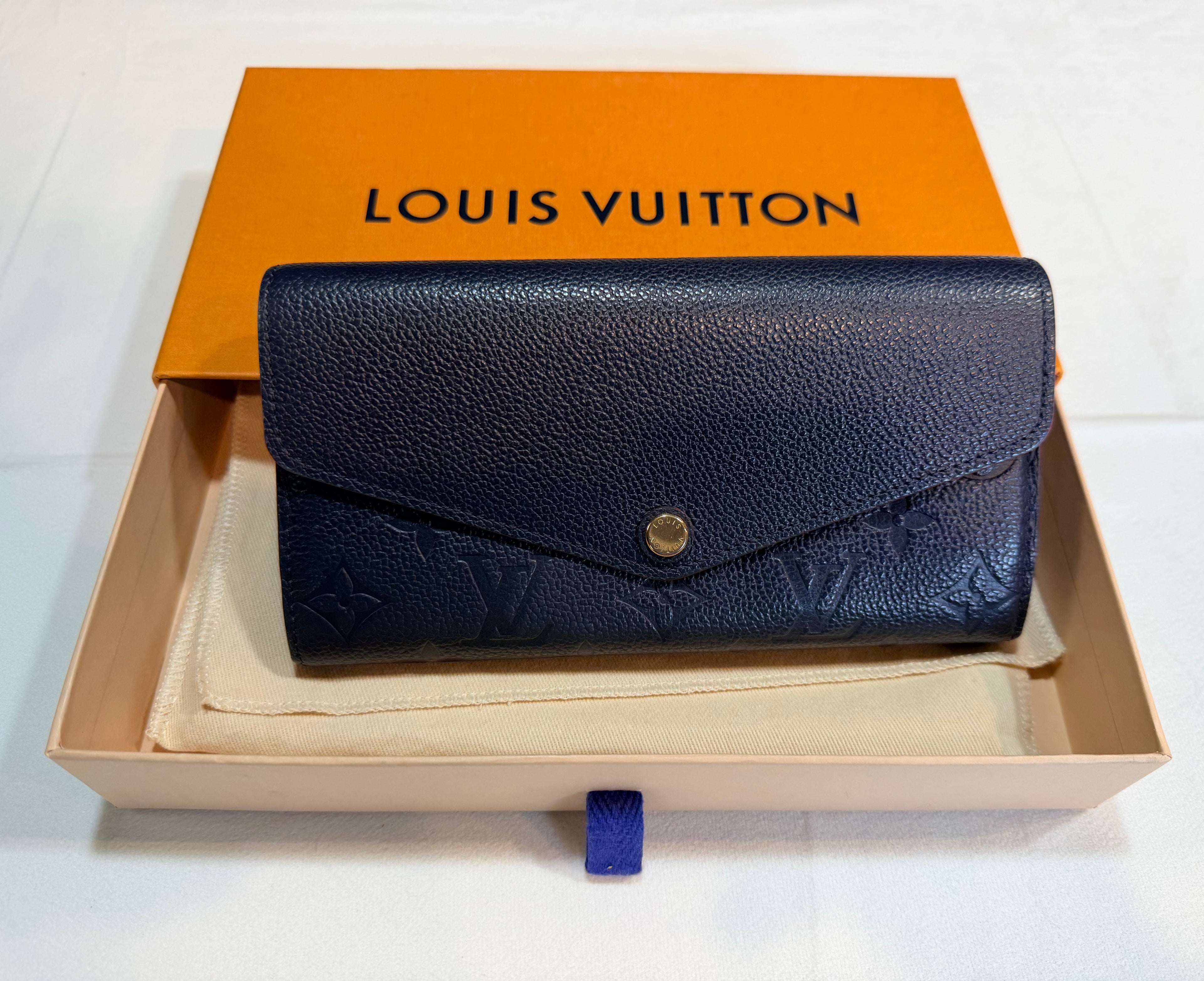 Louis Vuitton Sarah Wallet in Empreinte leather navy/red 42